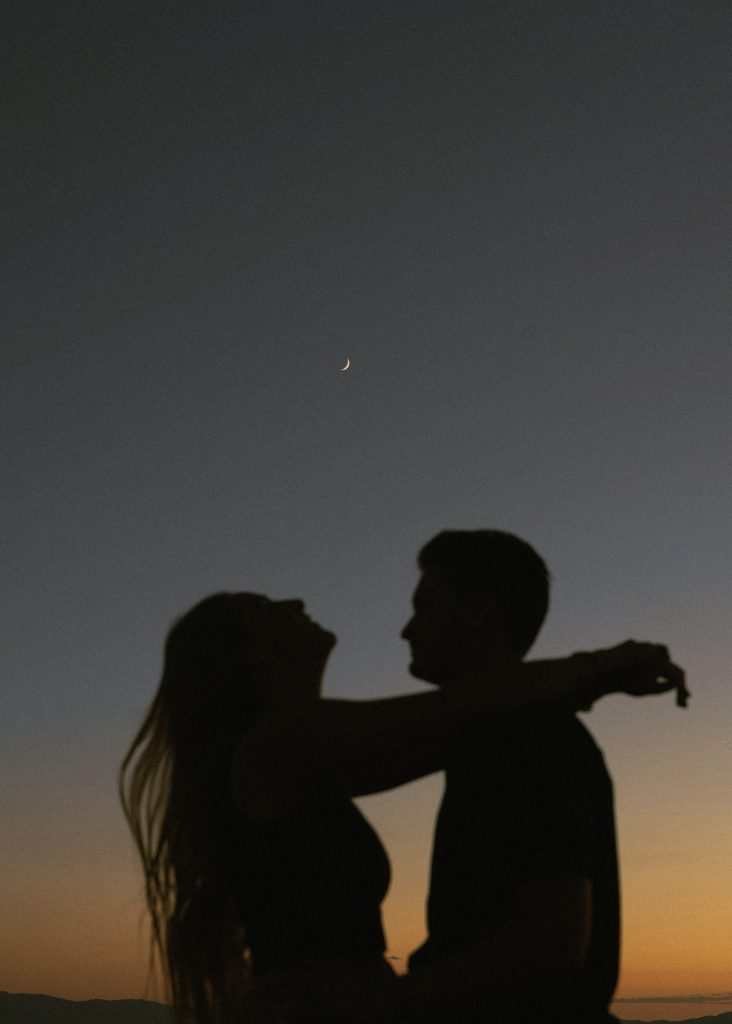 Silhouette sunset shot of couple