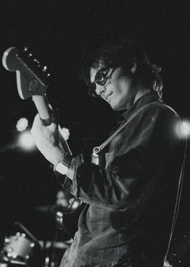 Black and white photo of Sarah and the Sundays guitarist