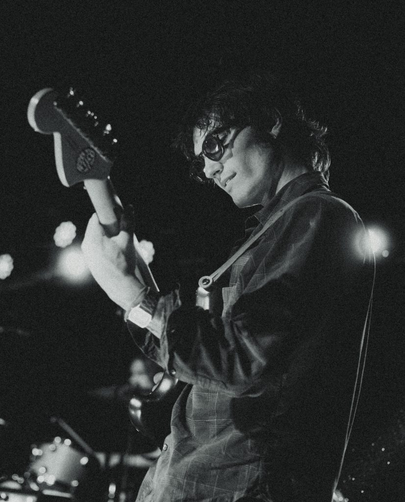 Black and white photo of Sarah and the Sundays guitarist